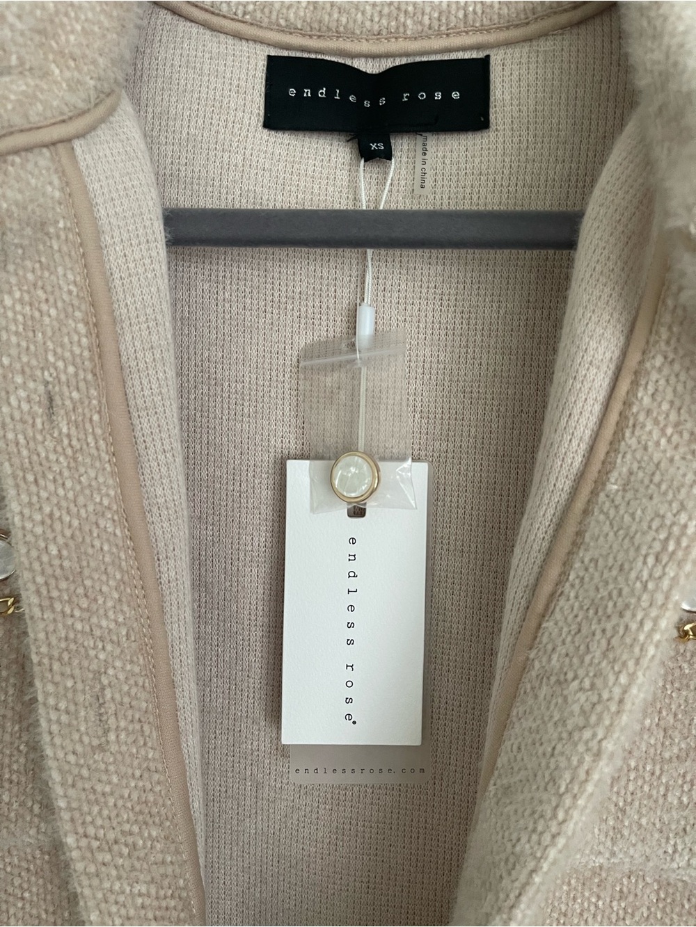 New Endless Rose Cropped Bouclé Jacket in Blush Chain Trim